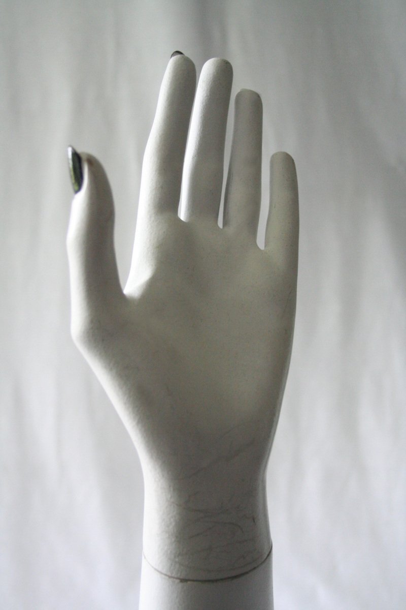 a hand with a manicured tip with nails