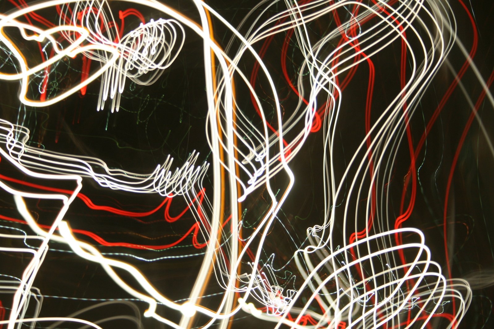 colorful light trails with bright red and white streaks