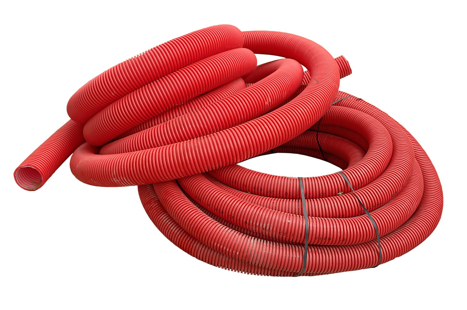 red colored plastic hoses sitting on top of each other
