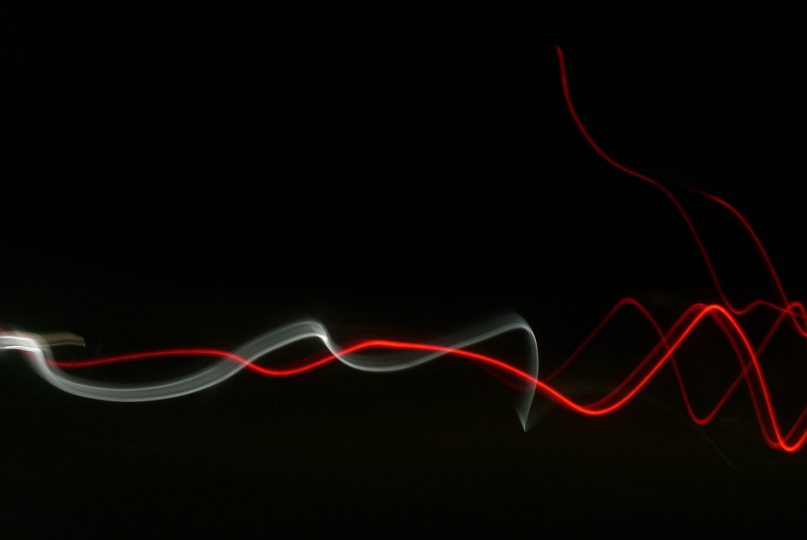 a blurry pograph of a long exposure of soing in the dark