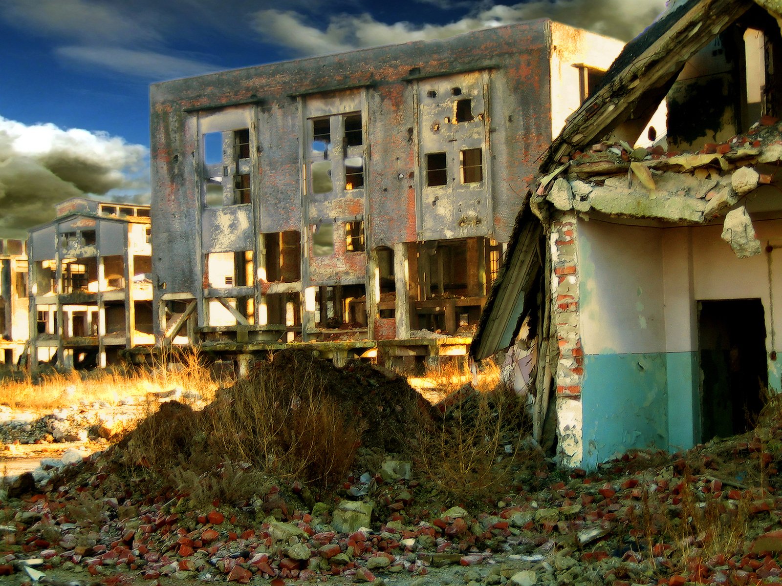 an old and dilapidated building with crumbling sidings