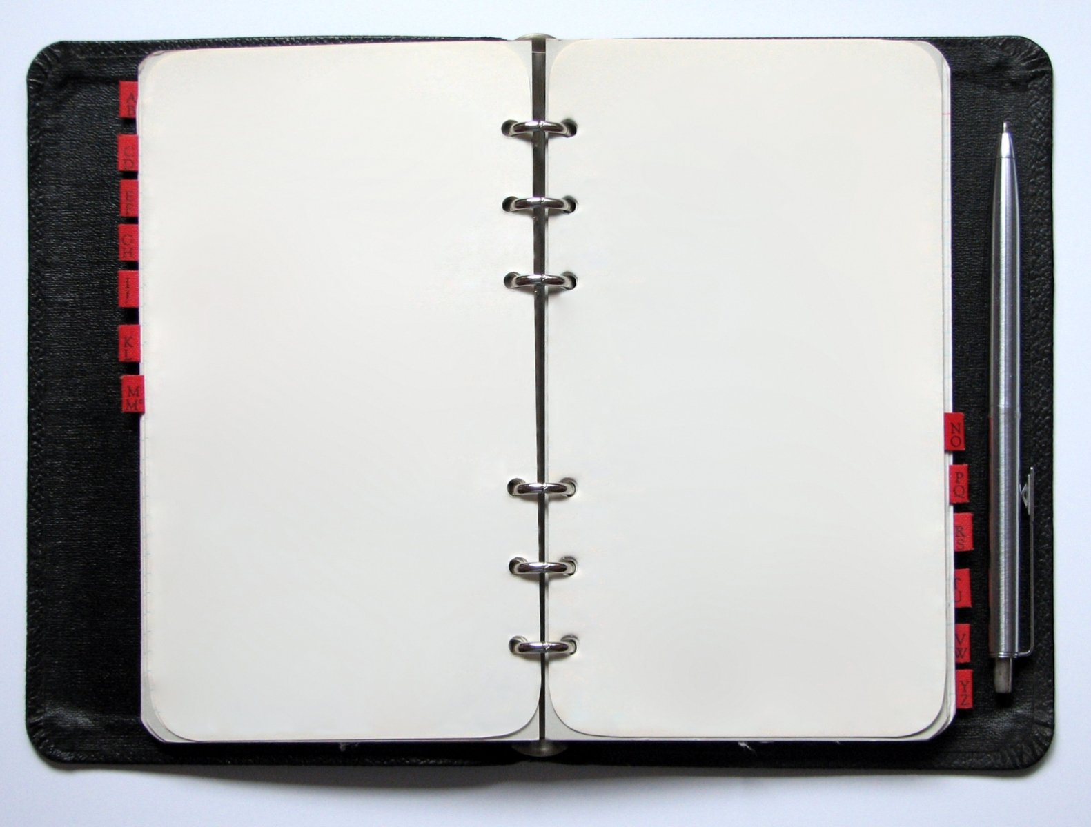 an open notebook sitting on top of a table