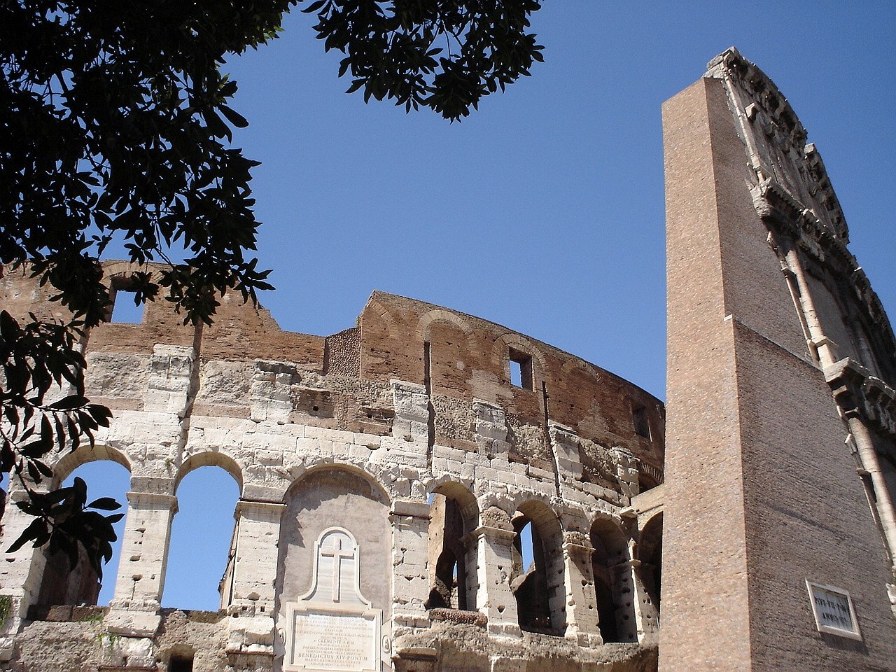 the ruins of a roman temple against a blue sky