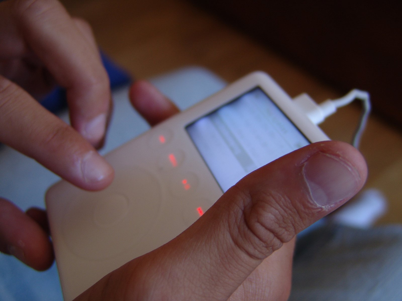 the hand that is pressing up the electronic device