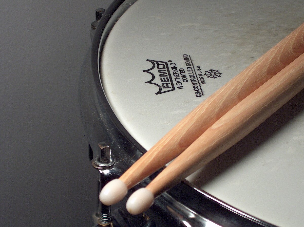 drumstick and a drum holder in a close up s