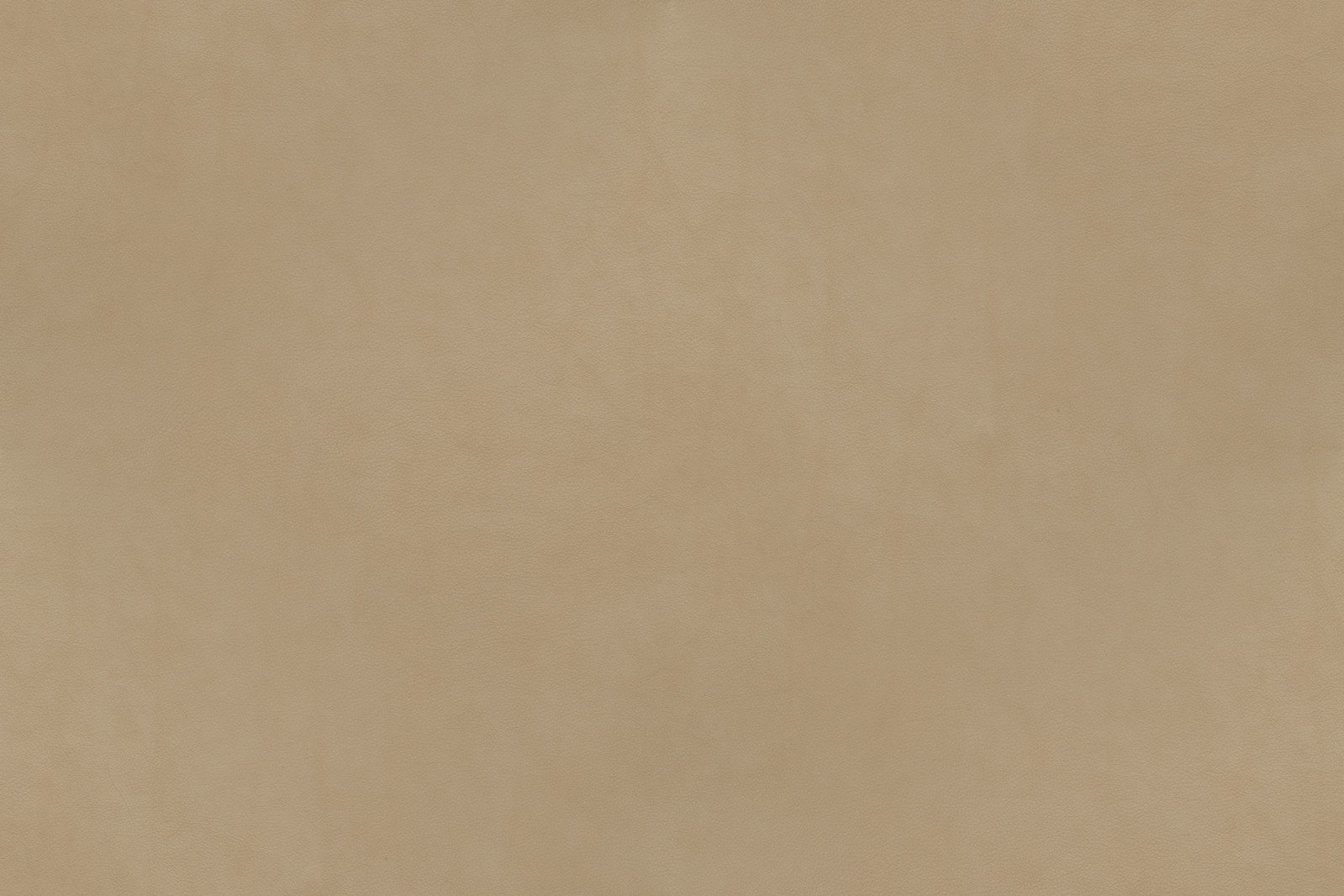 the light beige suede of a fabric background