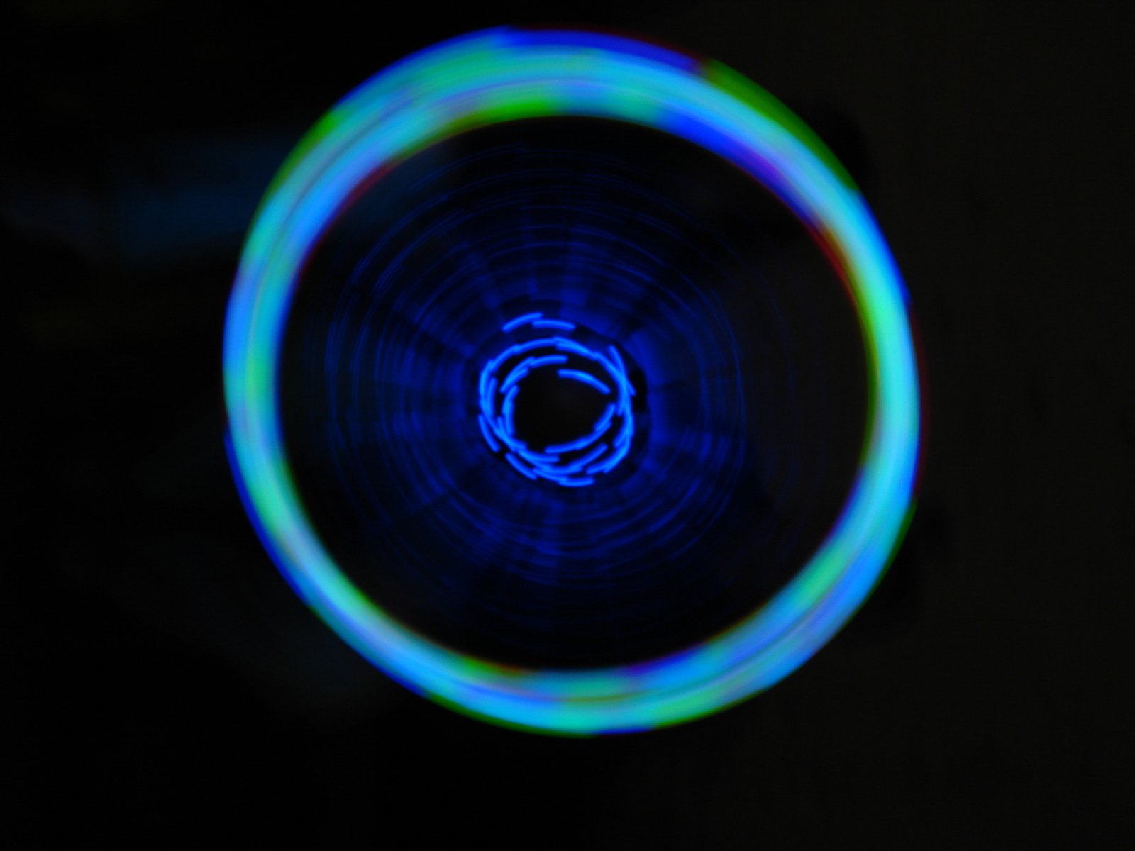 a disc with a light blue center in the middle