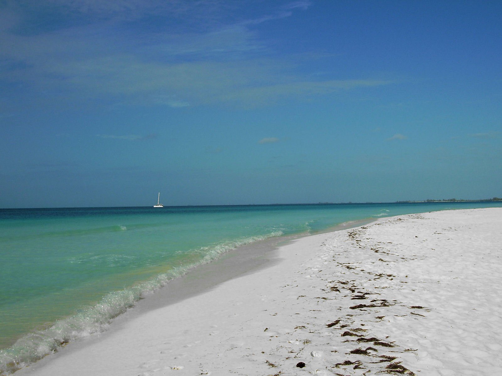 the beach is very clear and blue with water