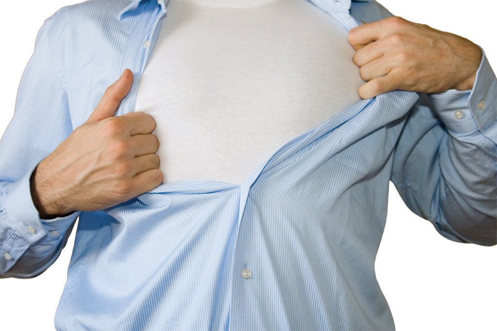 a man wearing a blue shirt, with one thumbs up and his other hand under the chest