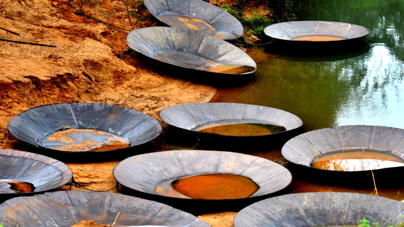 the concrete pots have been made into water troughs