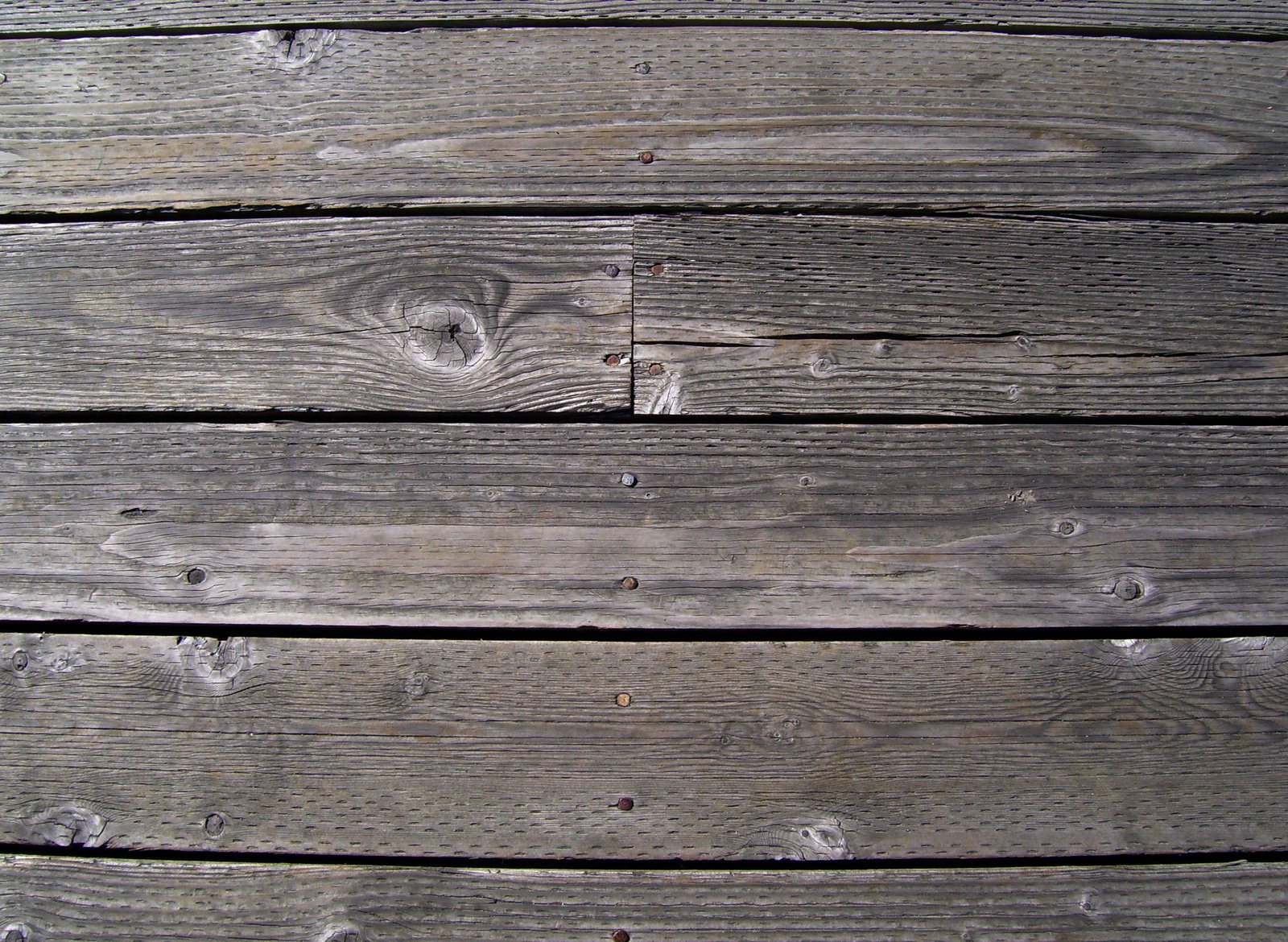 the wooden planks on the side of a building