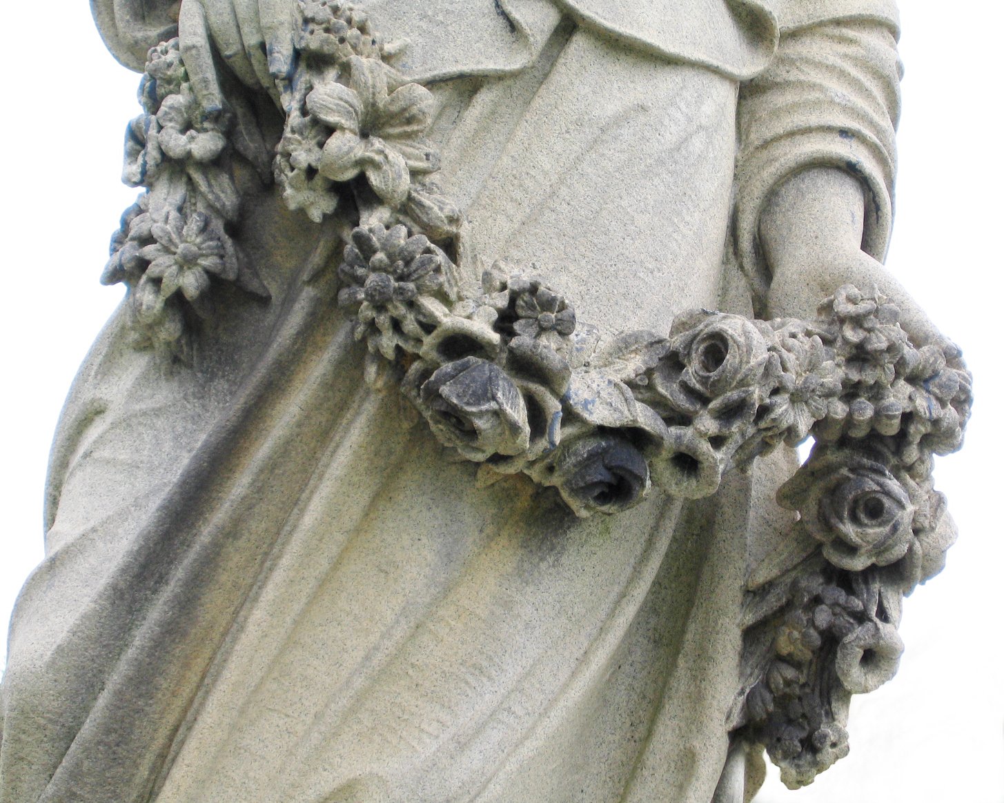 an image of a statue holding flowers for decoration