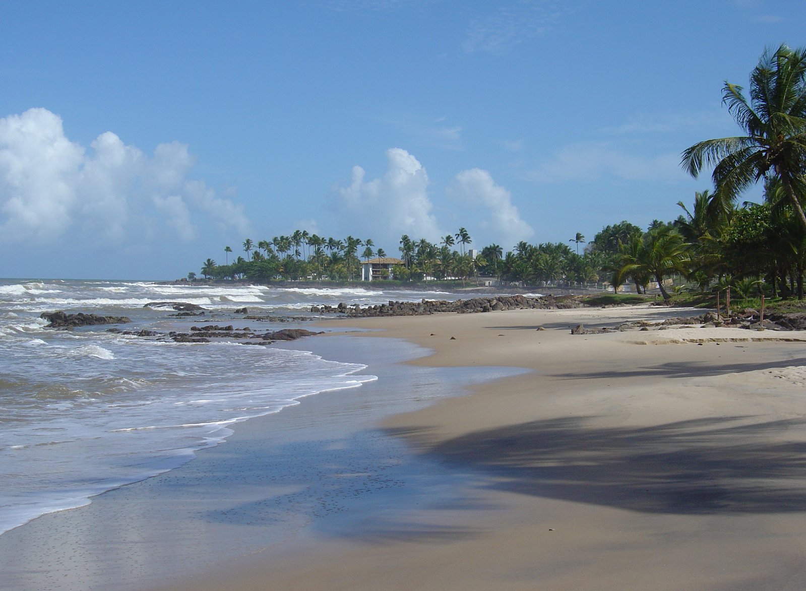 this is an ocean beach and a sandy shoreline