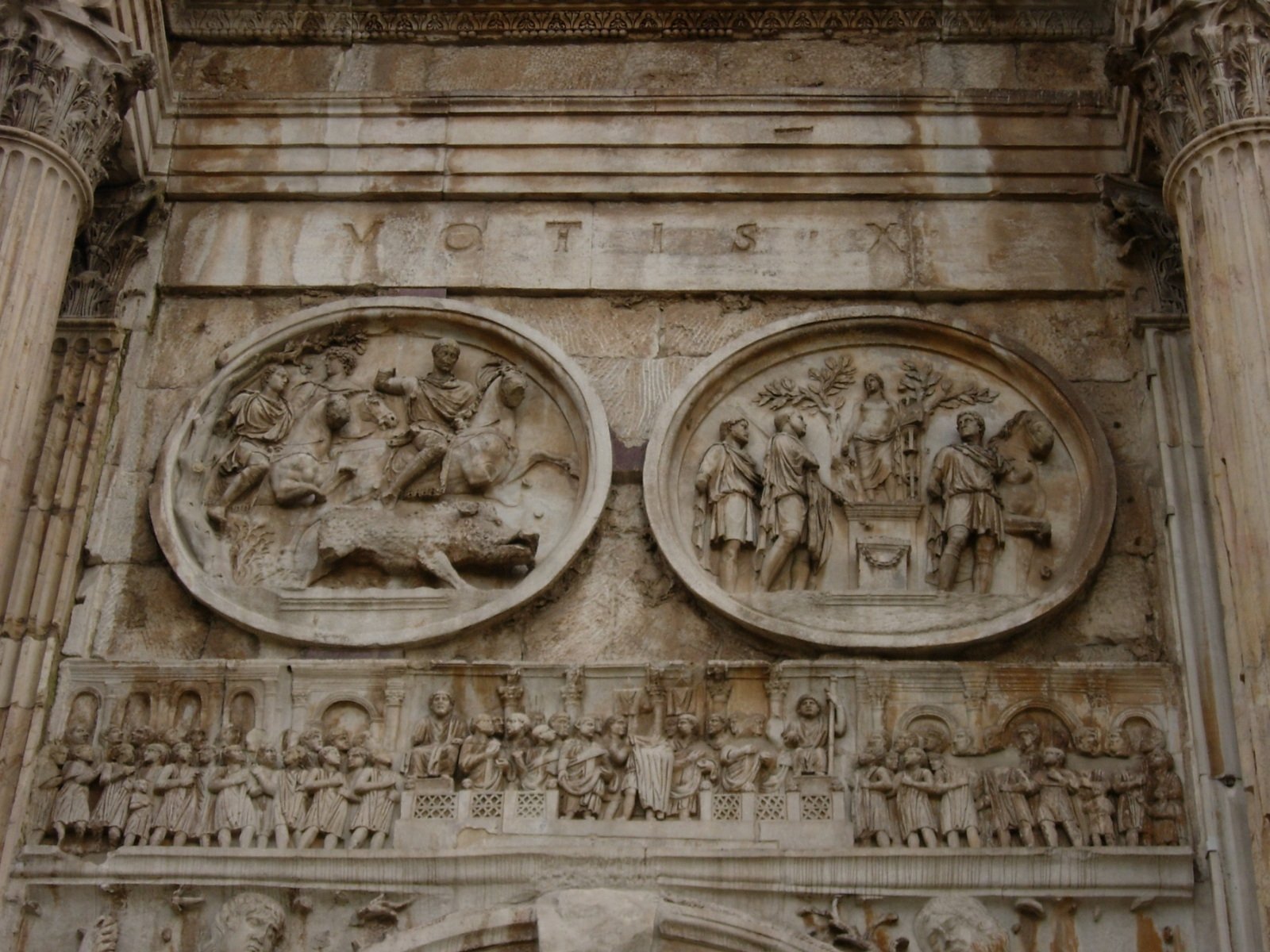 the carvings on the side of an old building