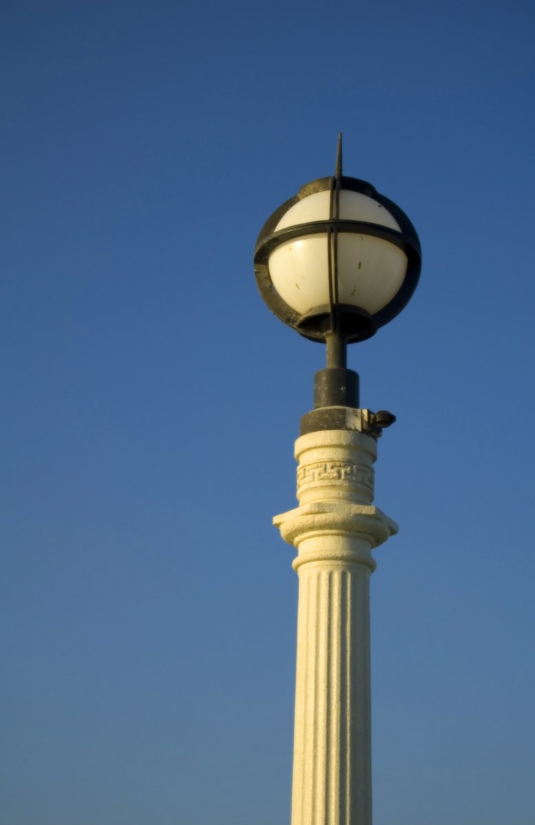 the lightpost has an eagle on it