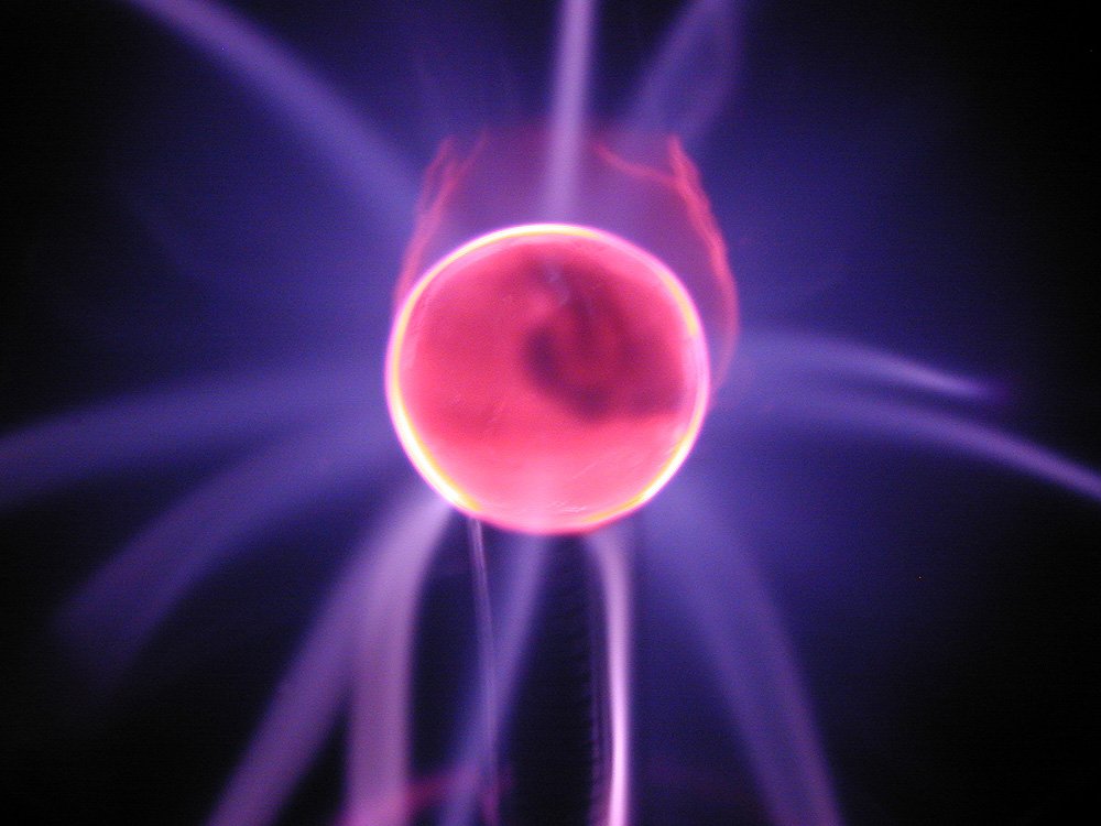a close up view of a ball with many blue lights in it