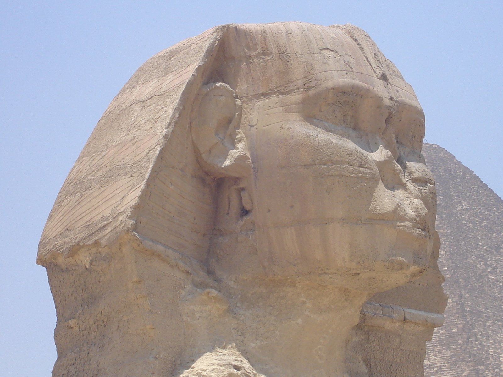an ancient monument with an sphinx at the bottom