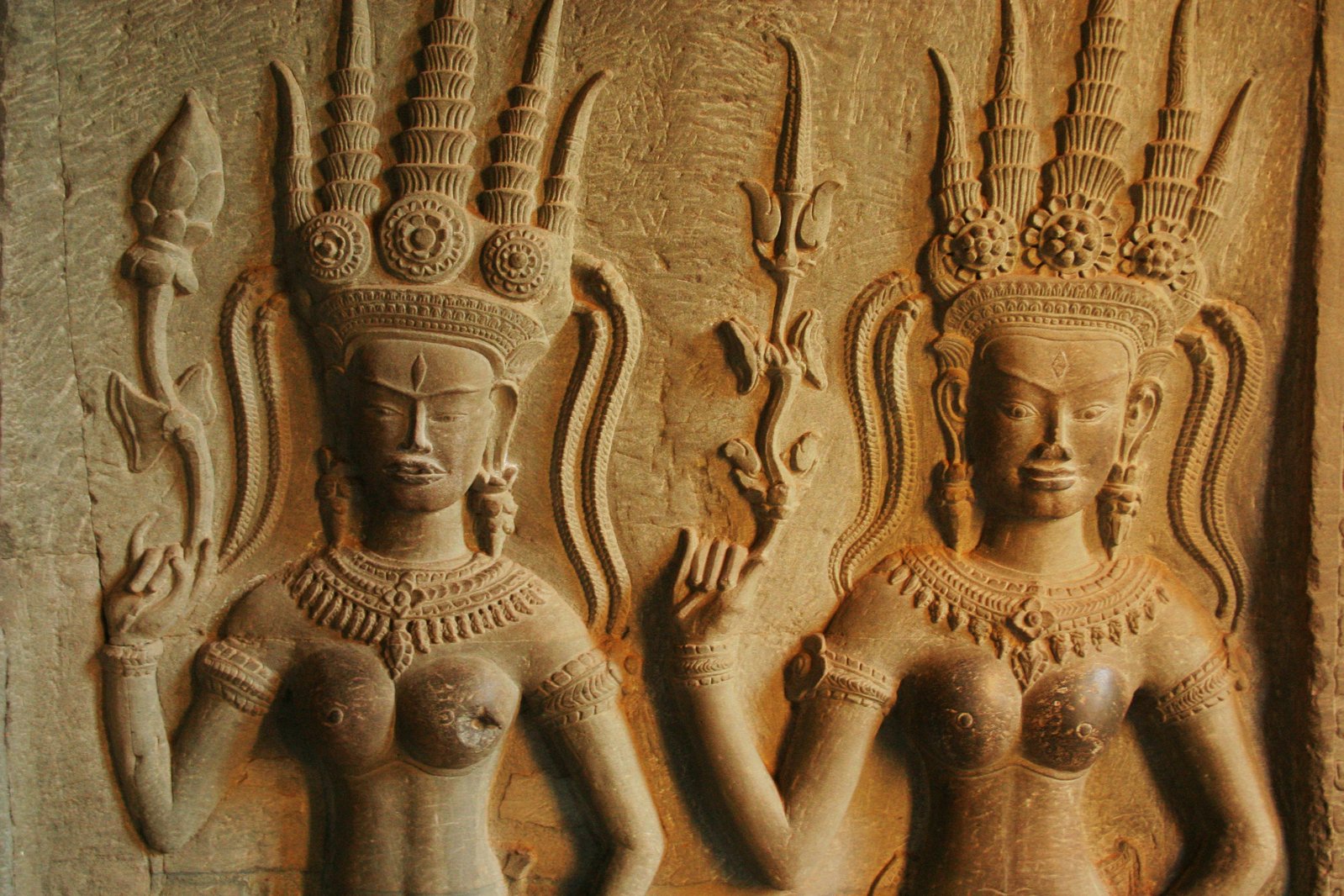 three carvings from the outer body of a statue