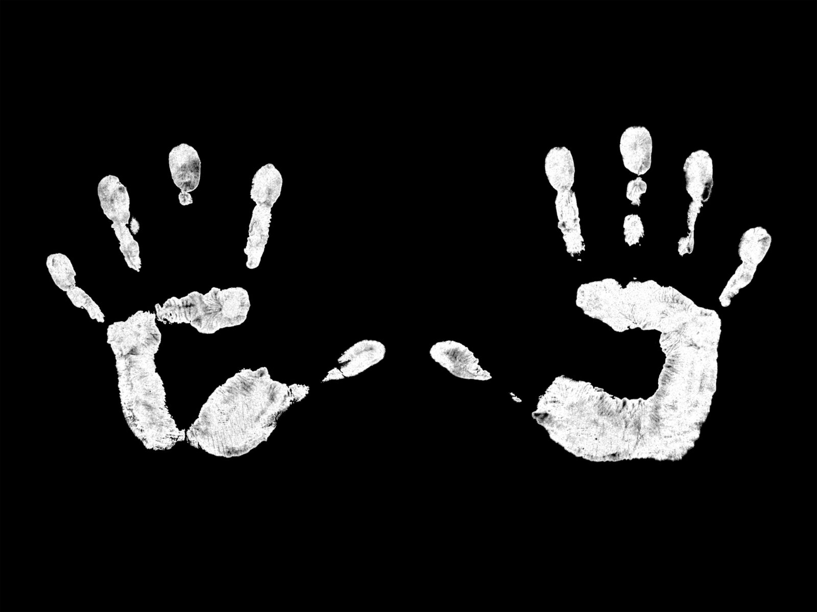 handprints are white with gray highlights in the middle