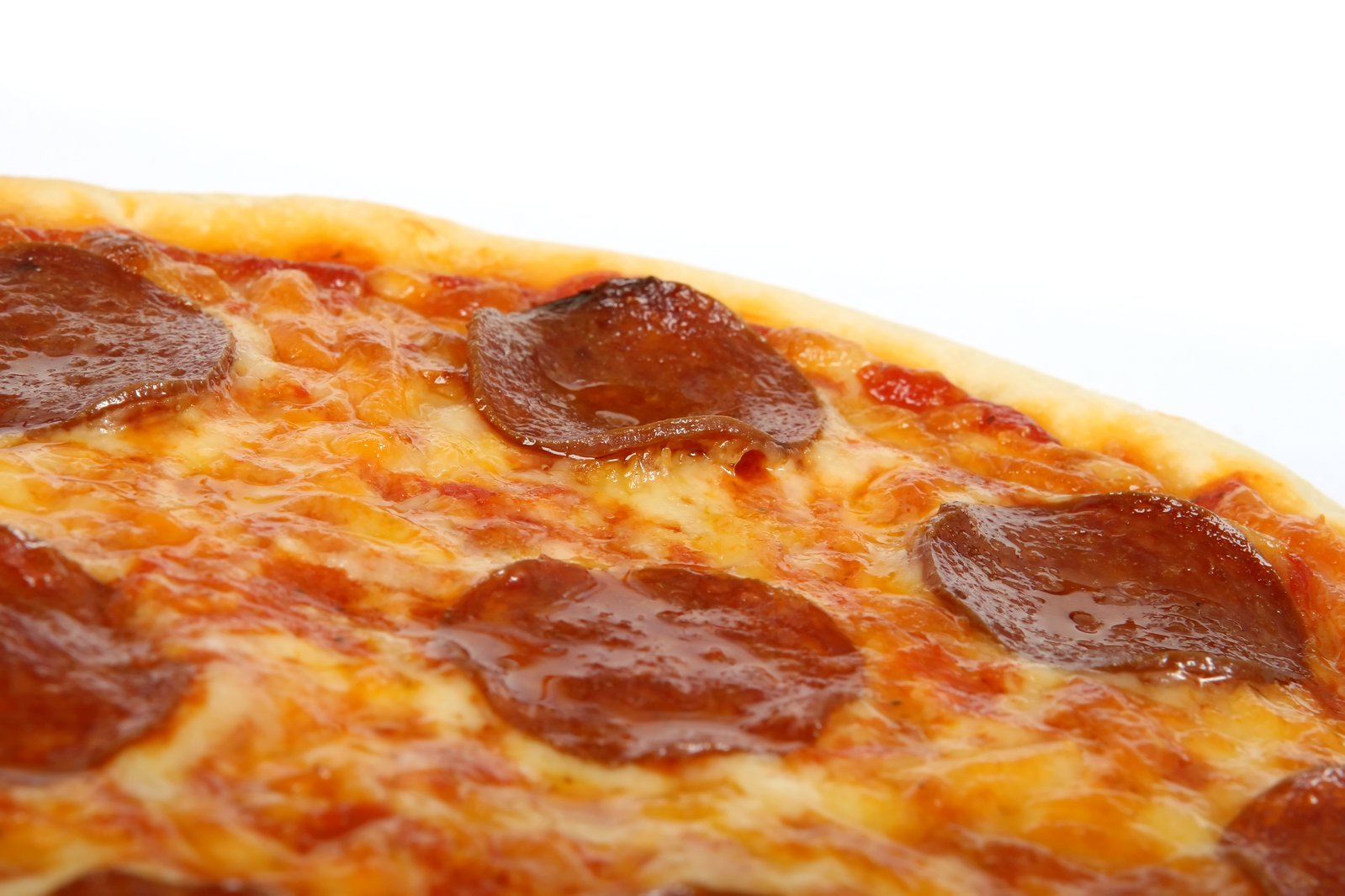 a pepperoni pizza is shown on top of a table