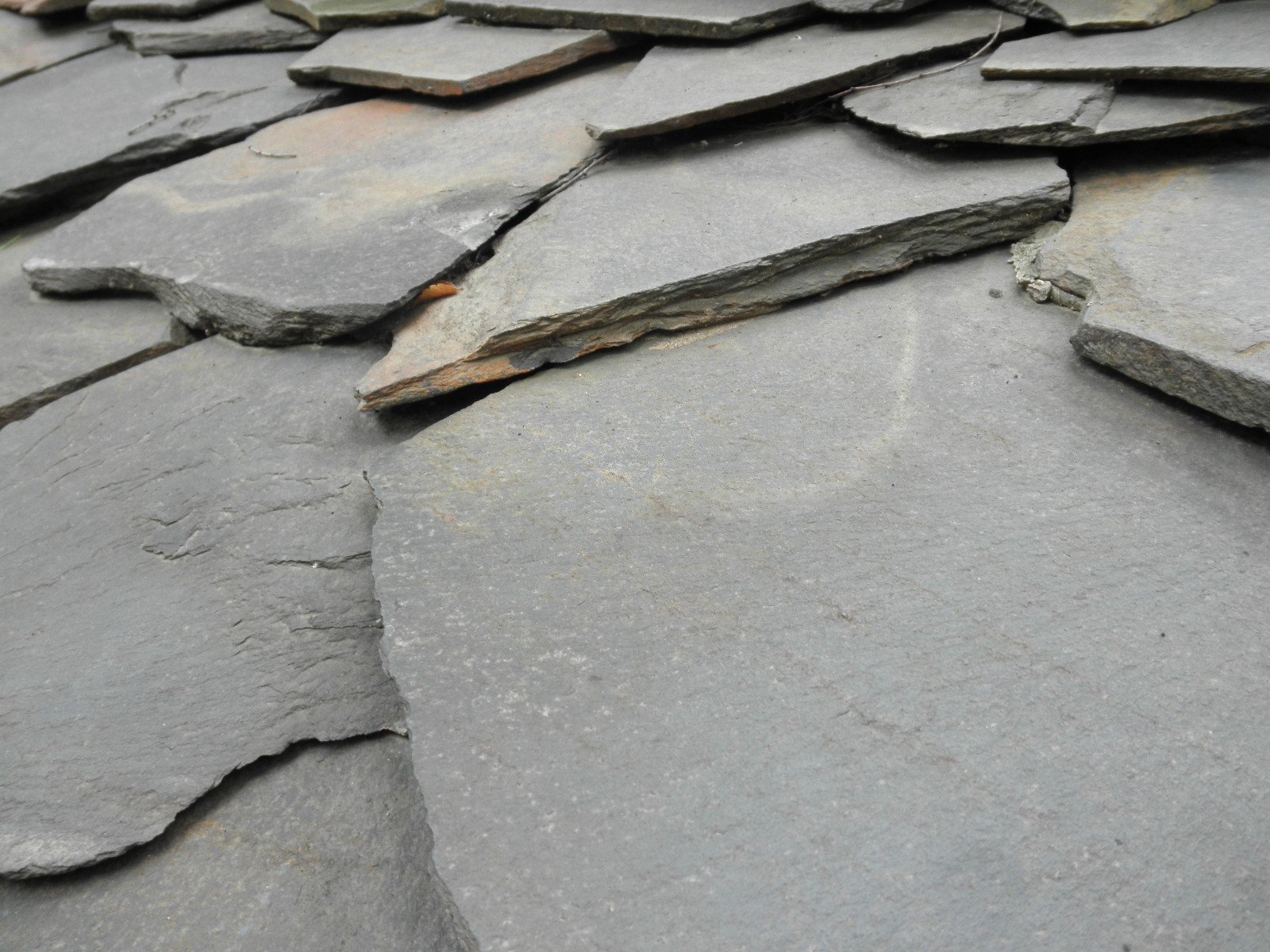 close up of stone tiles with yellow and white highlights