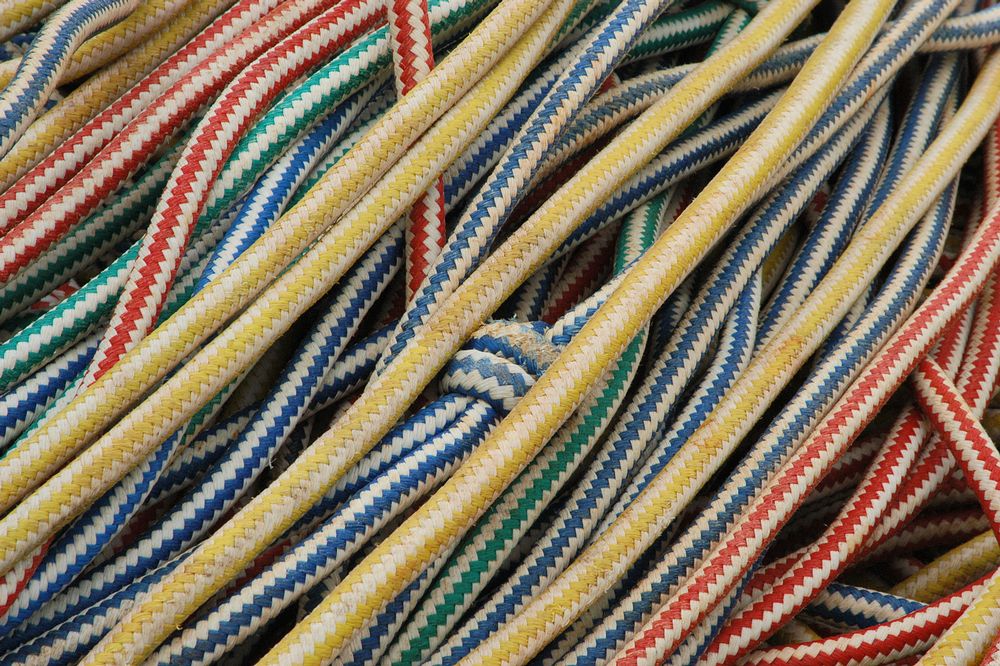 a group of ropes with many colors and stripes