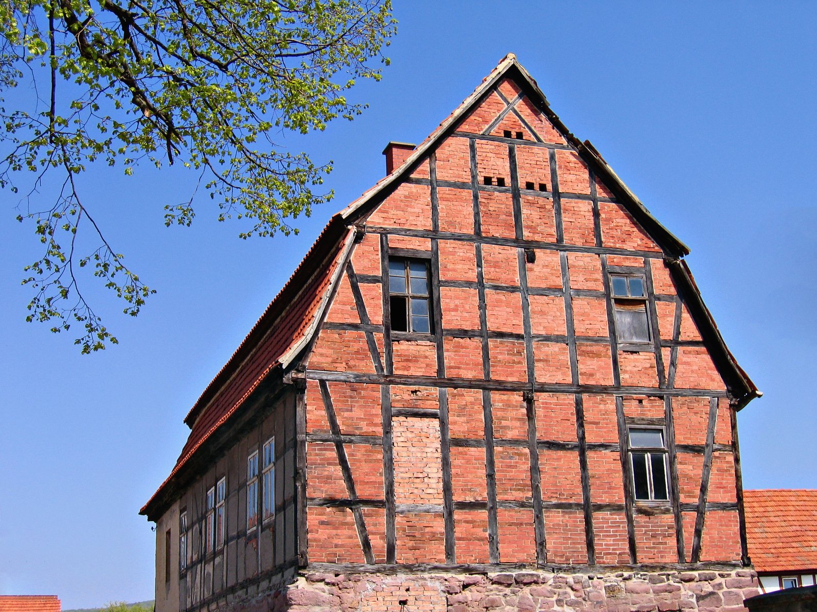 old buildings made of bricks on top of a hill