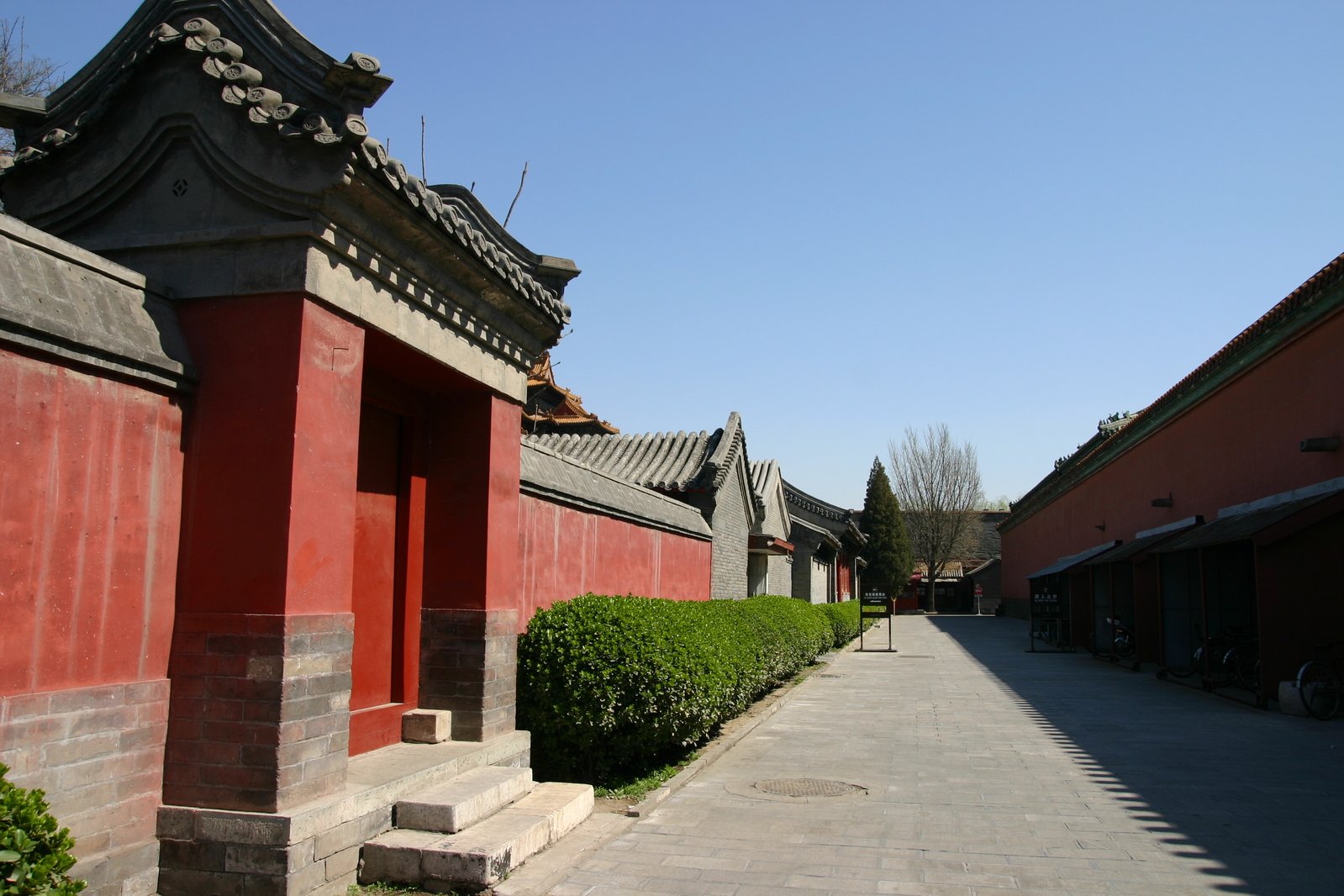 the building with three stories is red color