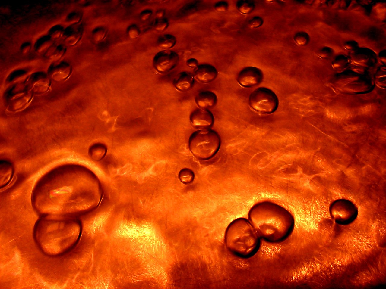 a  surface with some water droplets