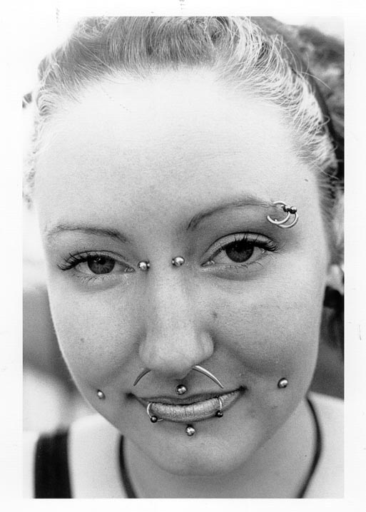 black and white pograph of girl with nose piercing