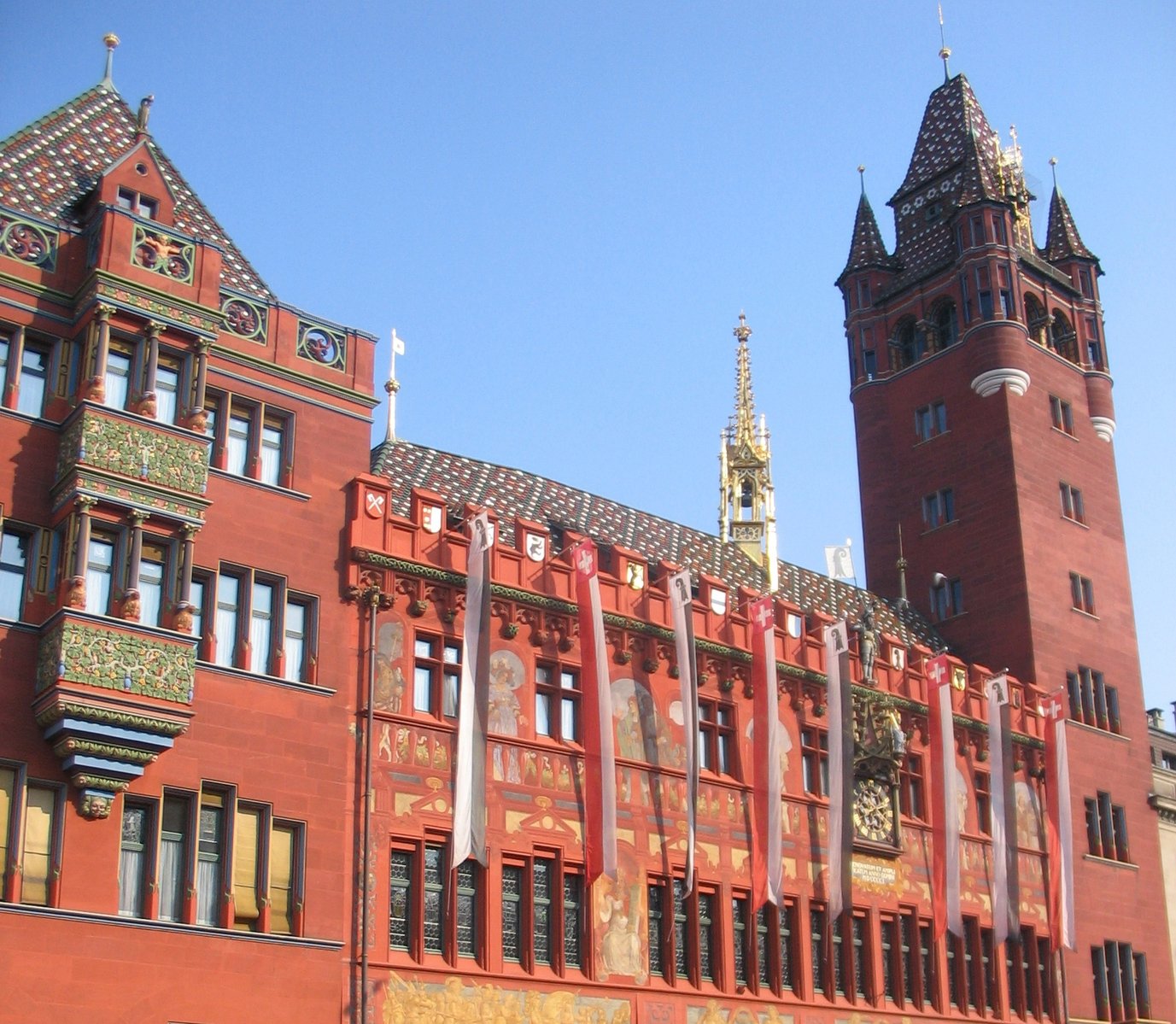 an ornate building with a clock tower in the middle