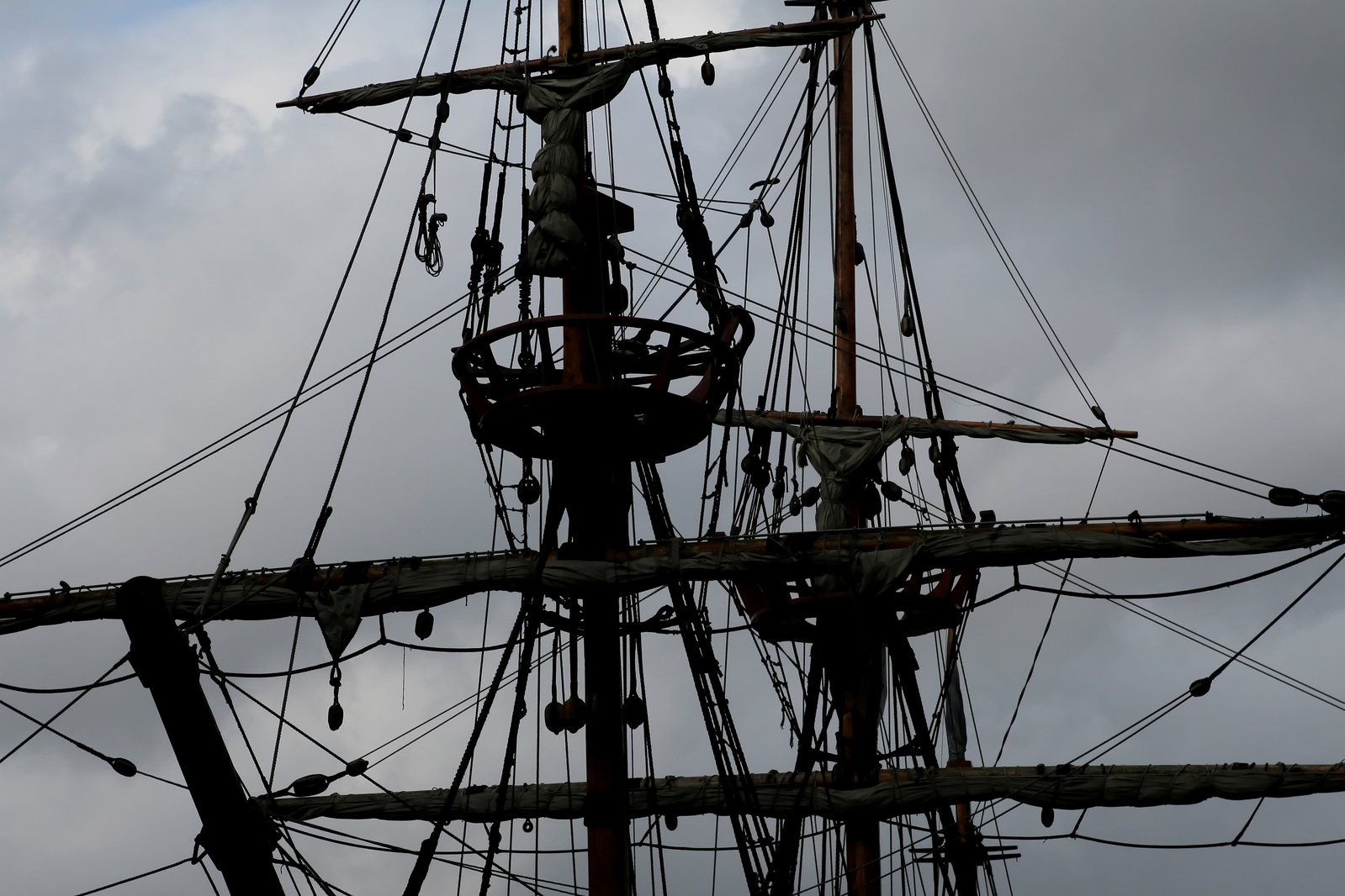 the ropes and rigs of a large ship are attached to it