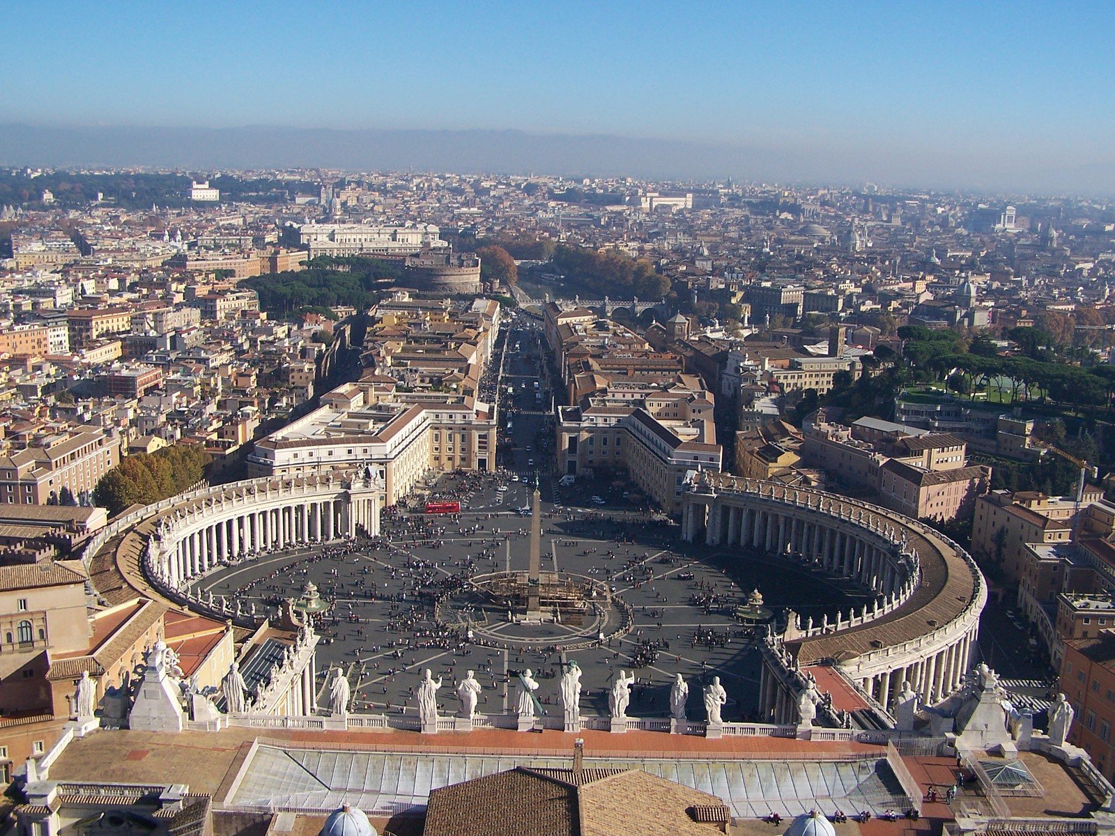 a large building with many columns and towers