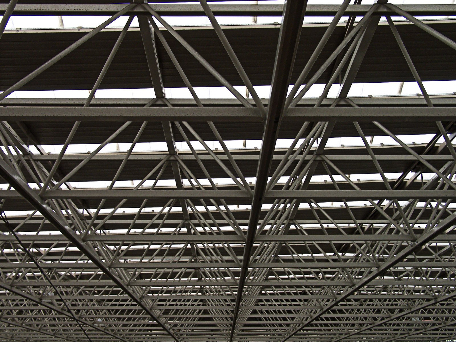 a close up of the top part of a structure with metal slats