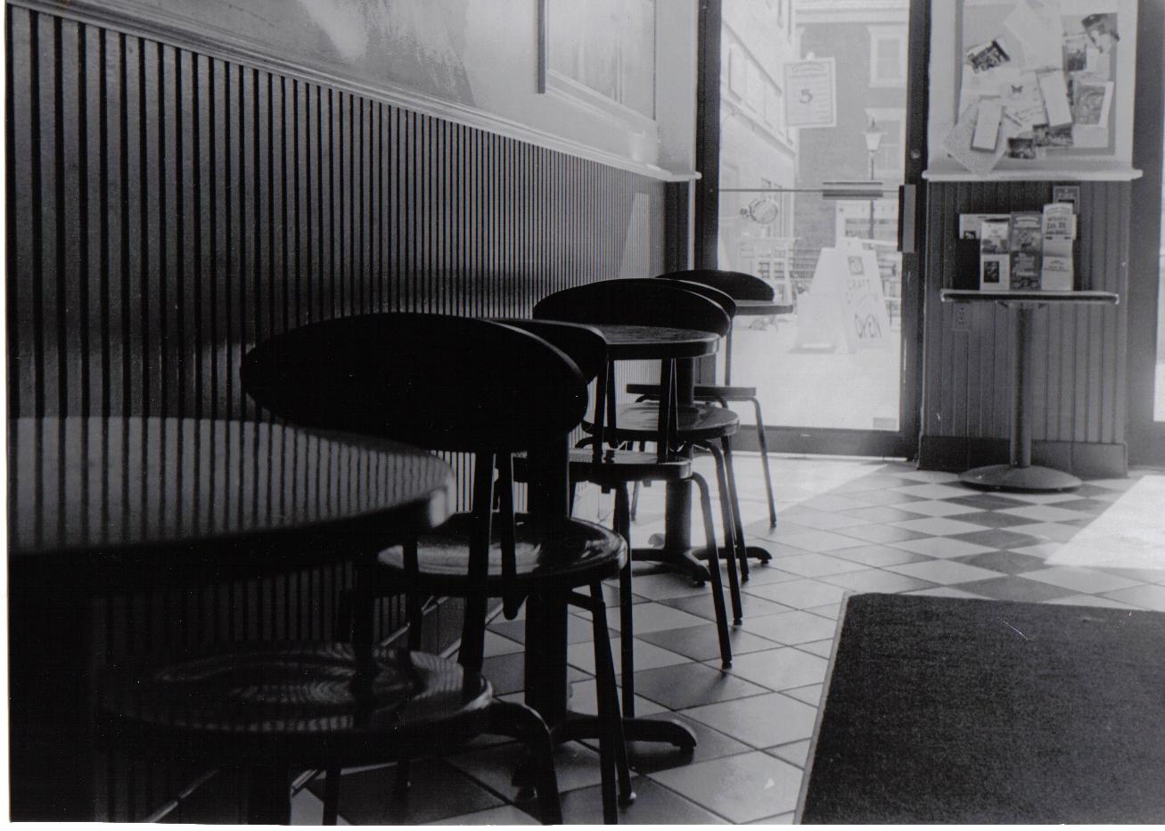 some chairs and counter on a tile floor