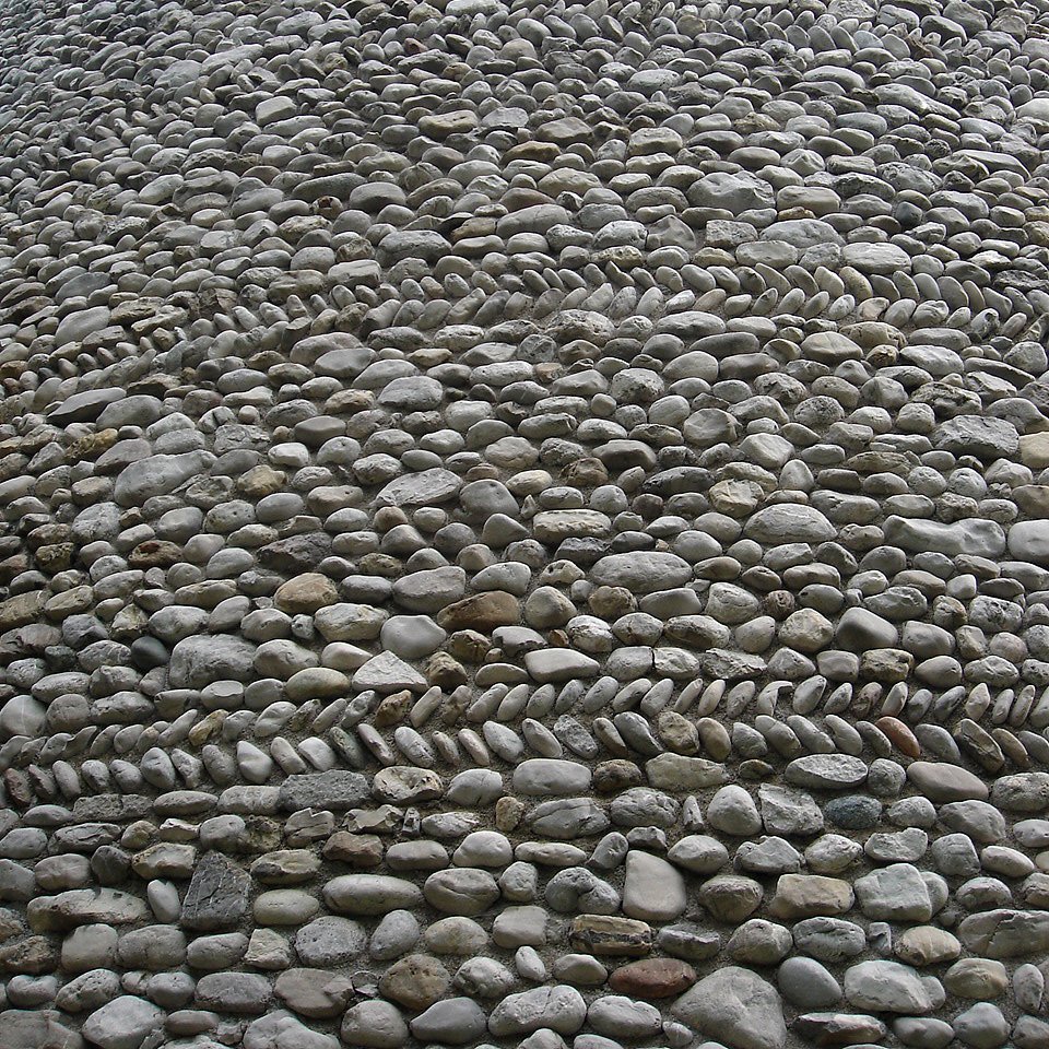 stone pavement with gray stones patterning it