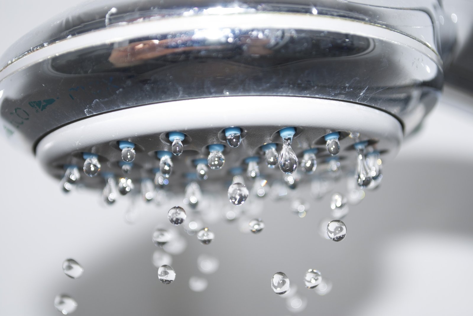 this is an image of some shower heads with water coming out
