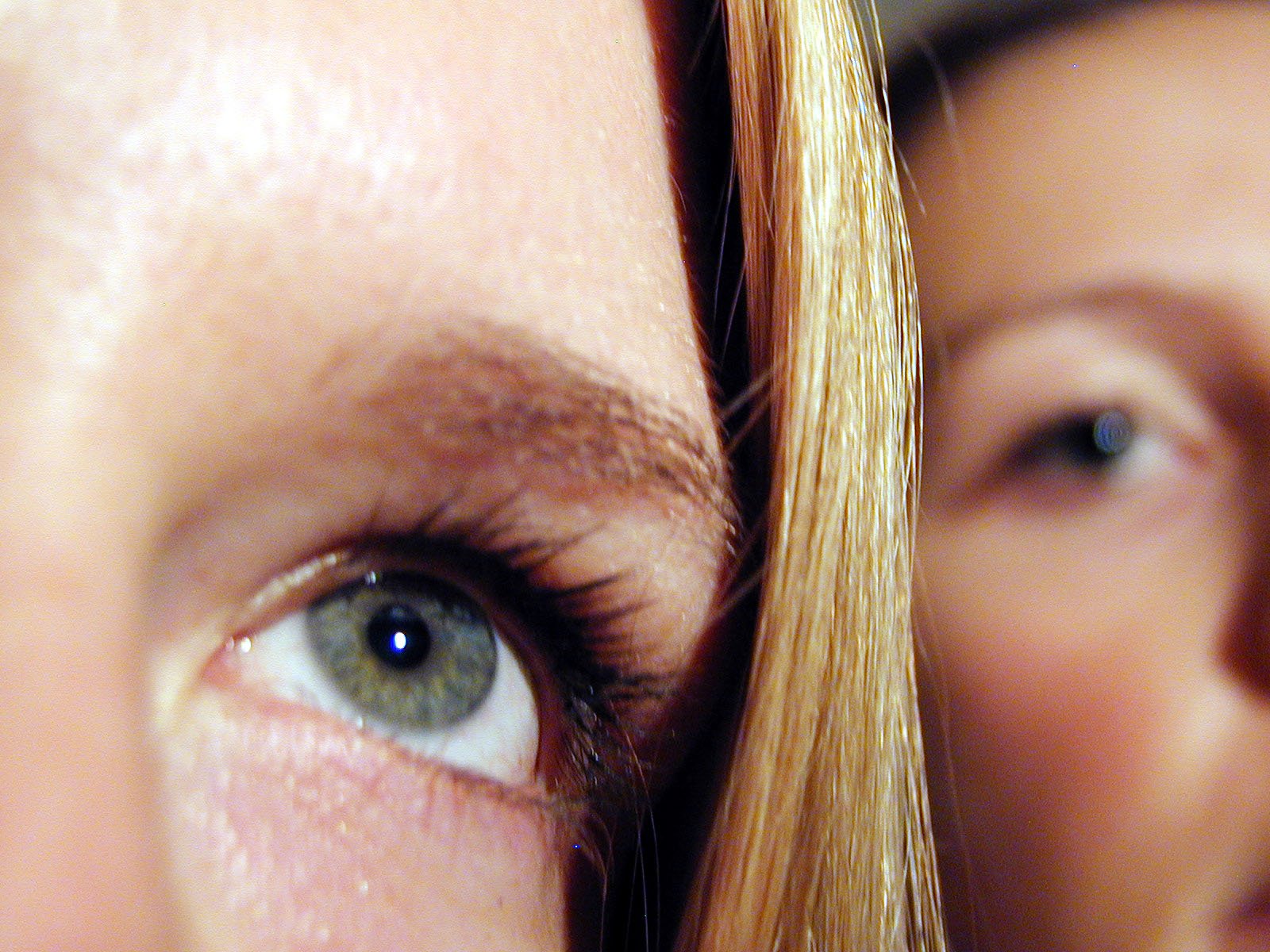 two women are shown looking at each other