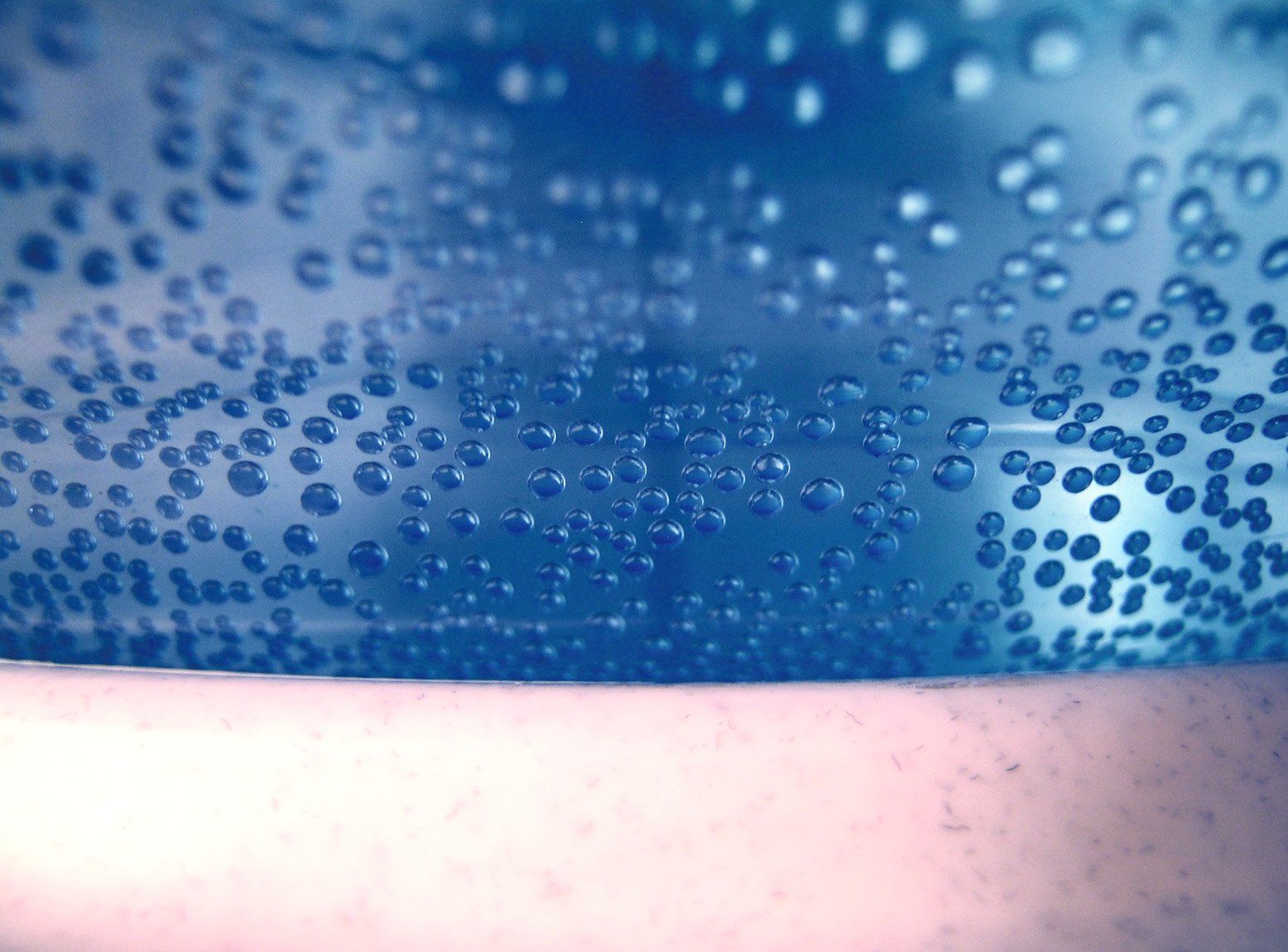 the inside of a glass has water drops