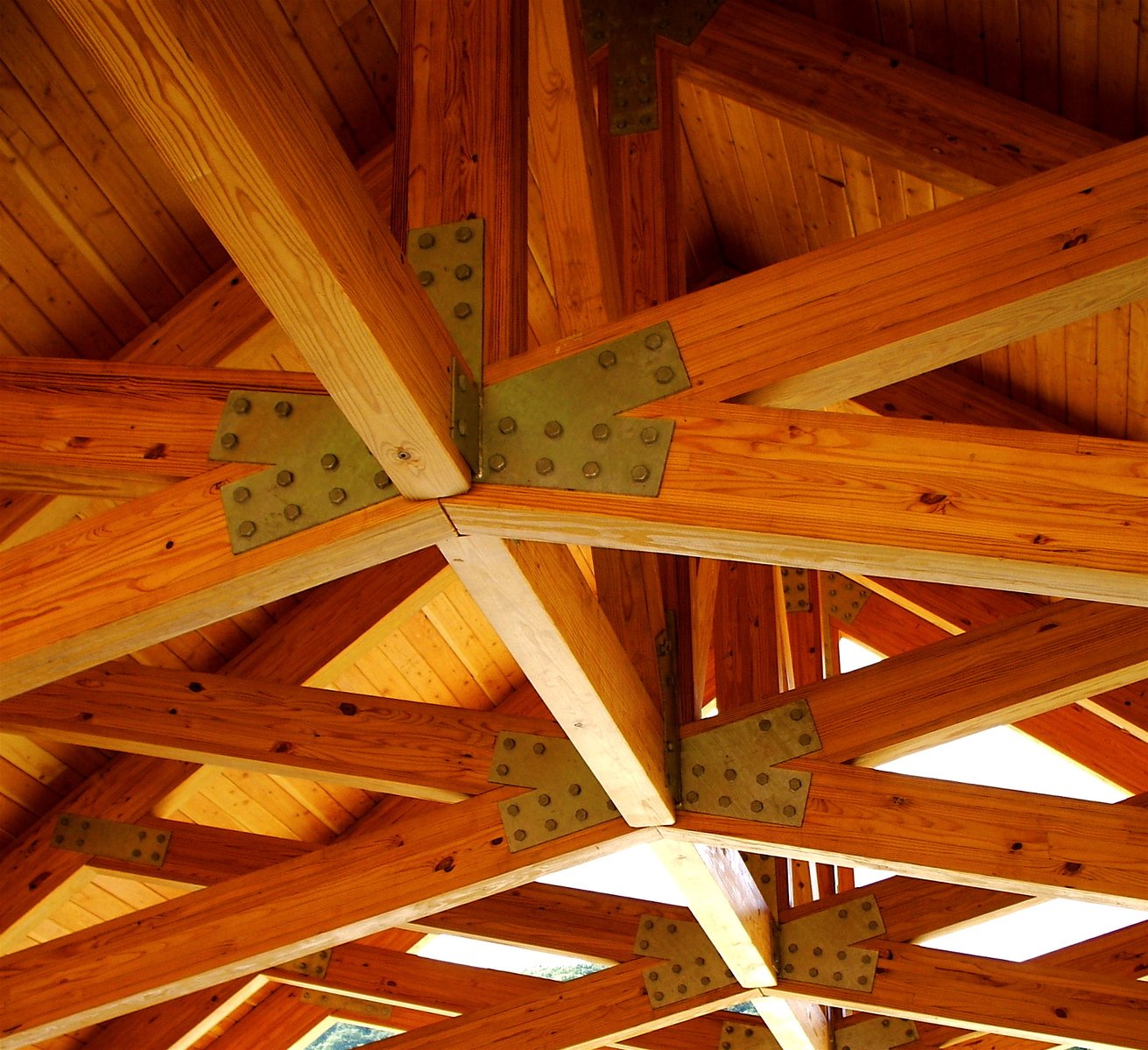 some wooden ceiling with studded in beams