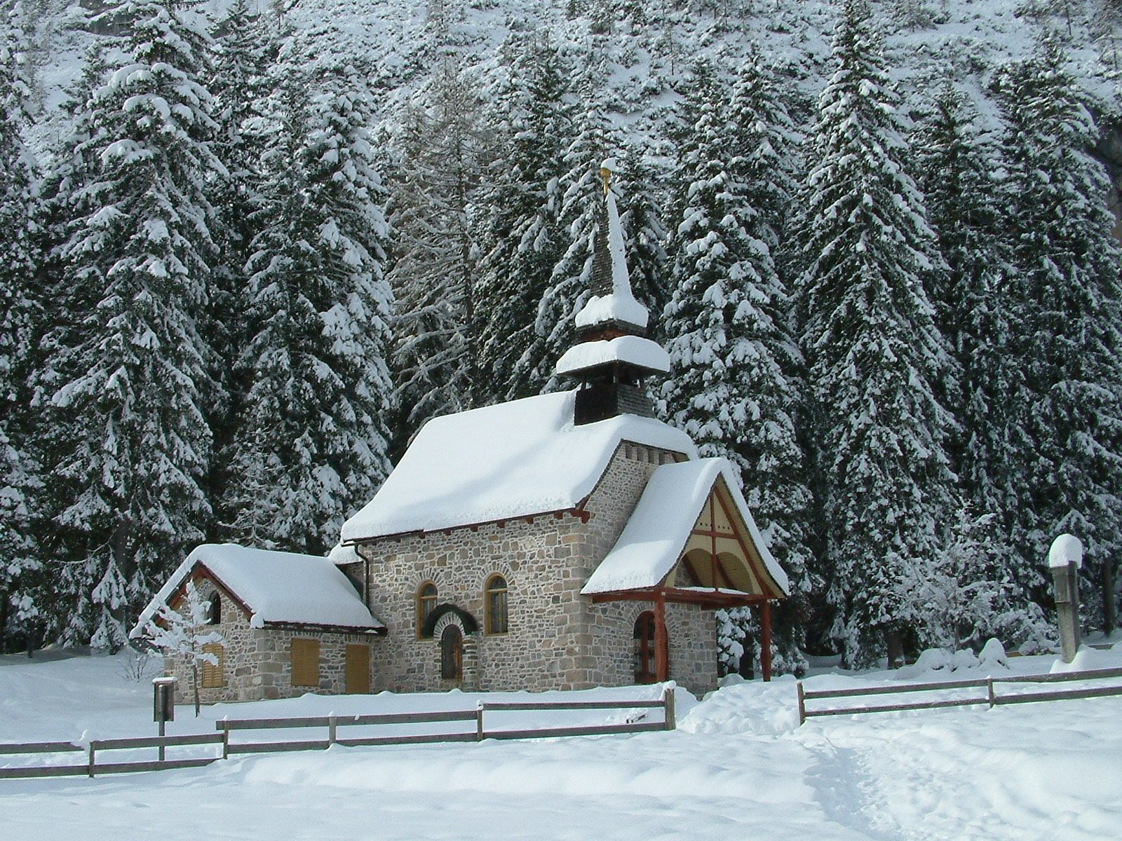 a large church in the middle of snow