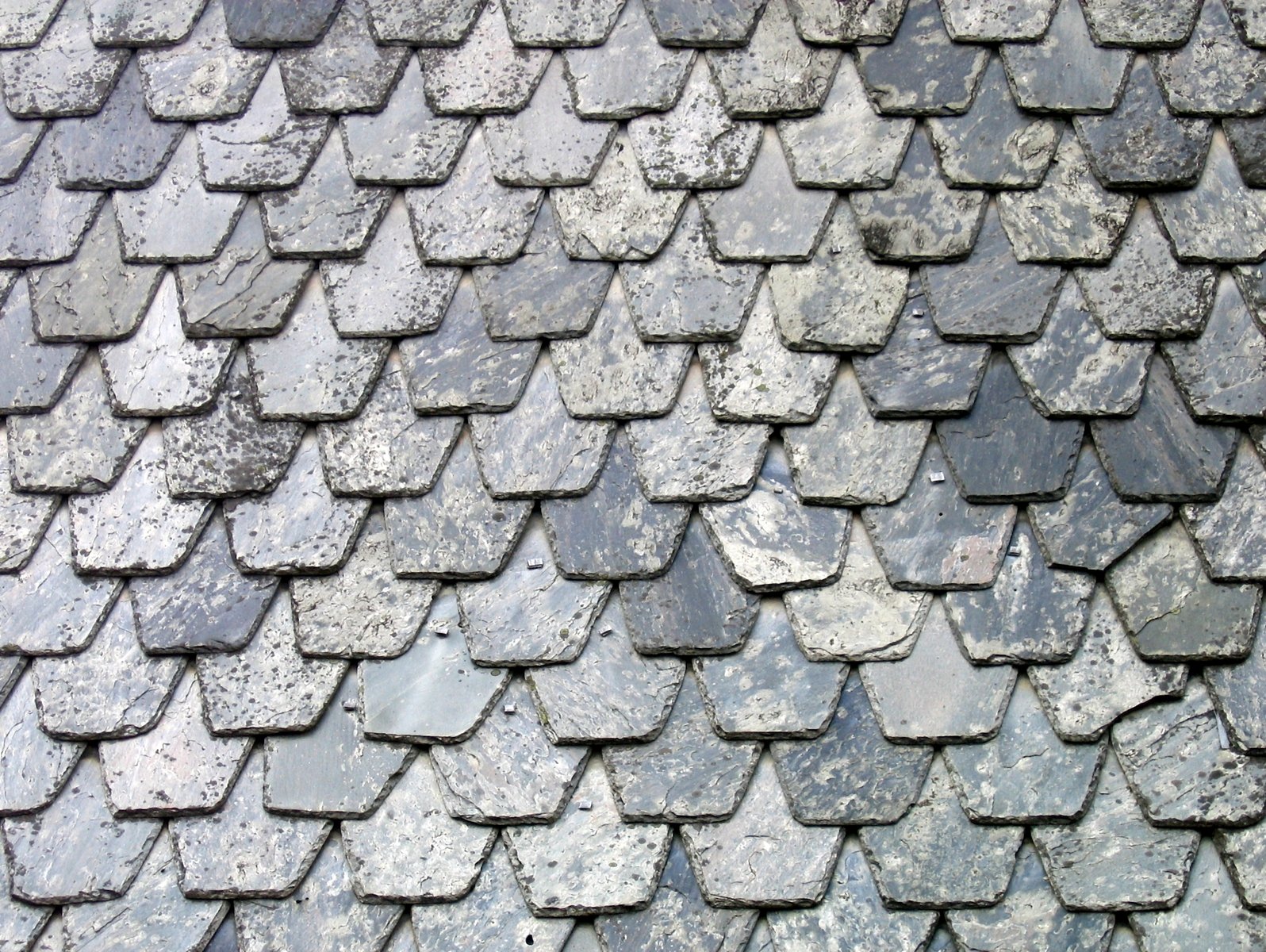 this is a picture of a decorative roof made out of grey tiles