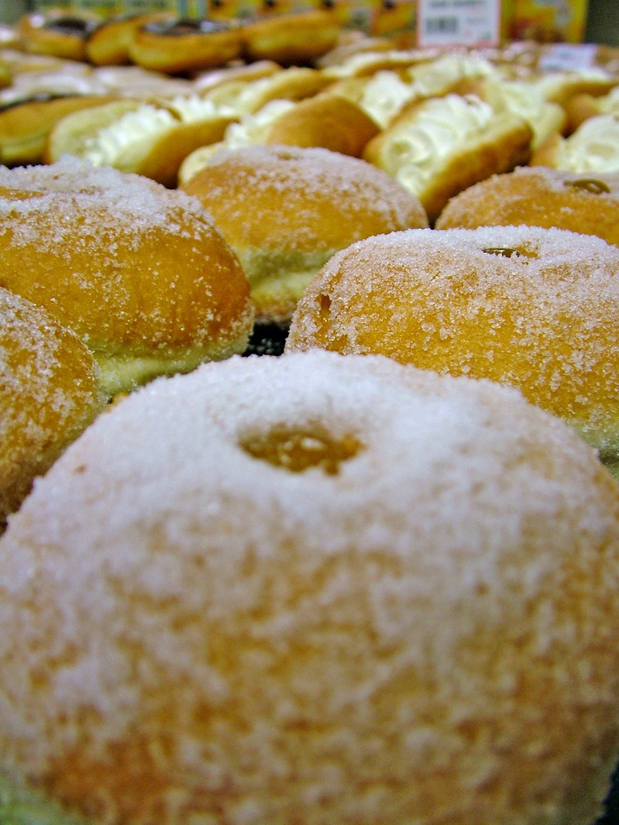 there are many different kinds of pastries on display