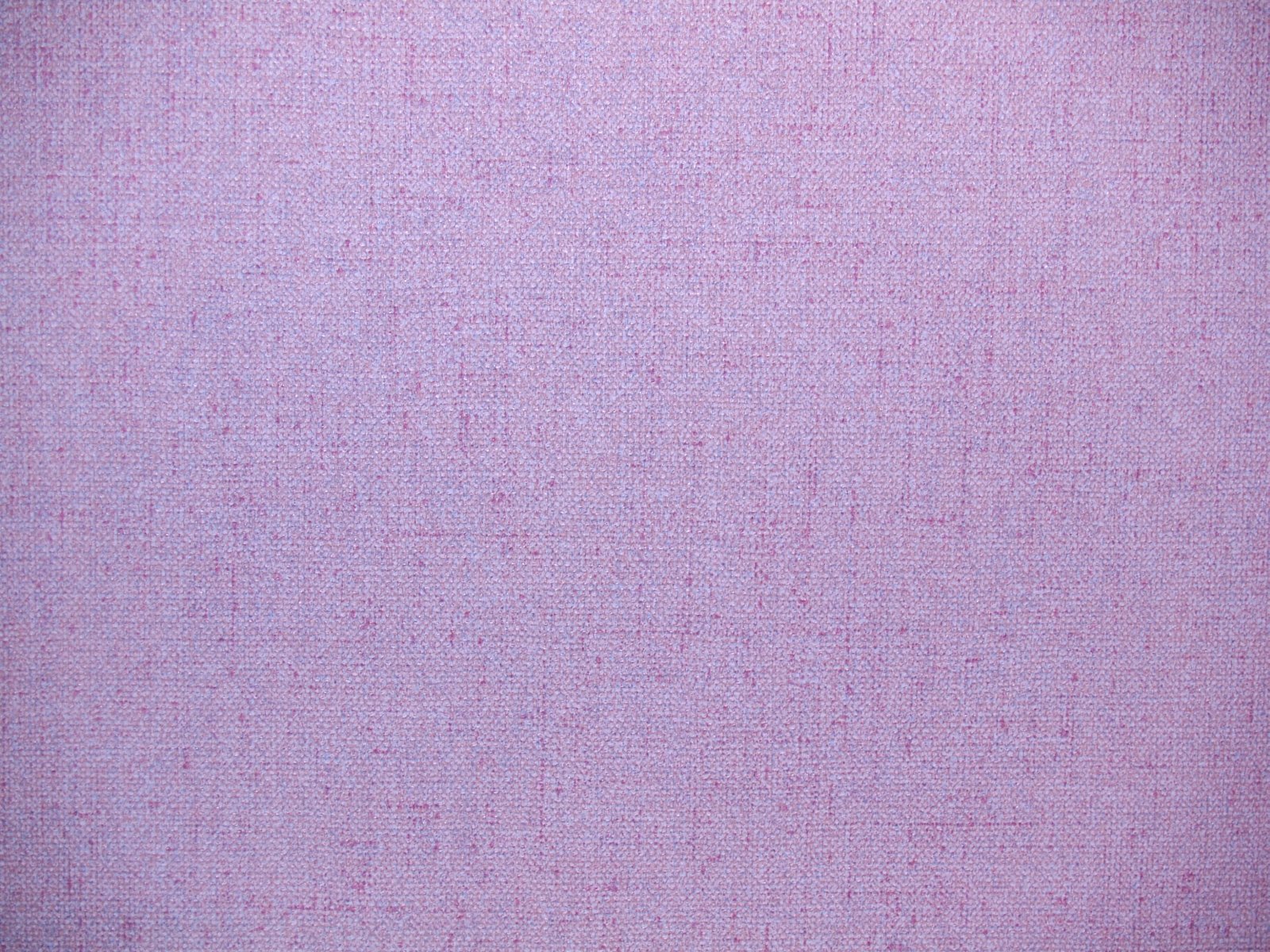 light pink cloth textured with small white dots