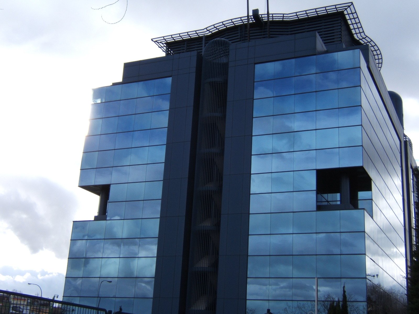 a large blue building with windows on top