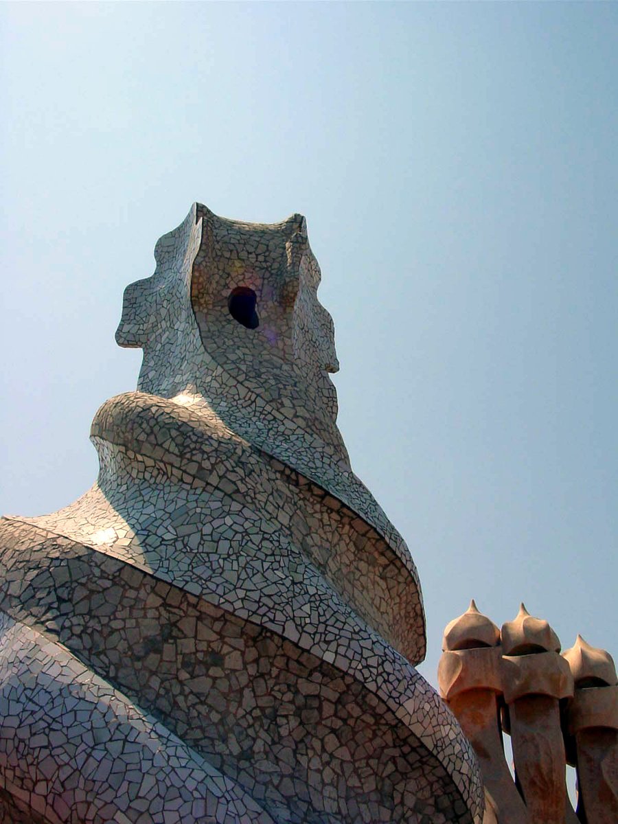 this is an old statue looking up at the sky