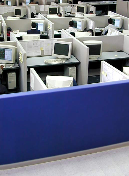 this is an office cubicle with many computers