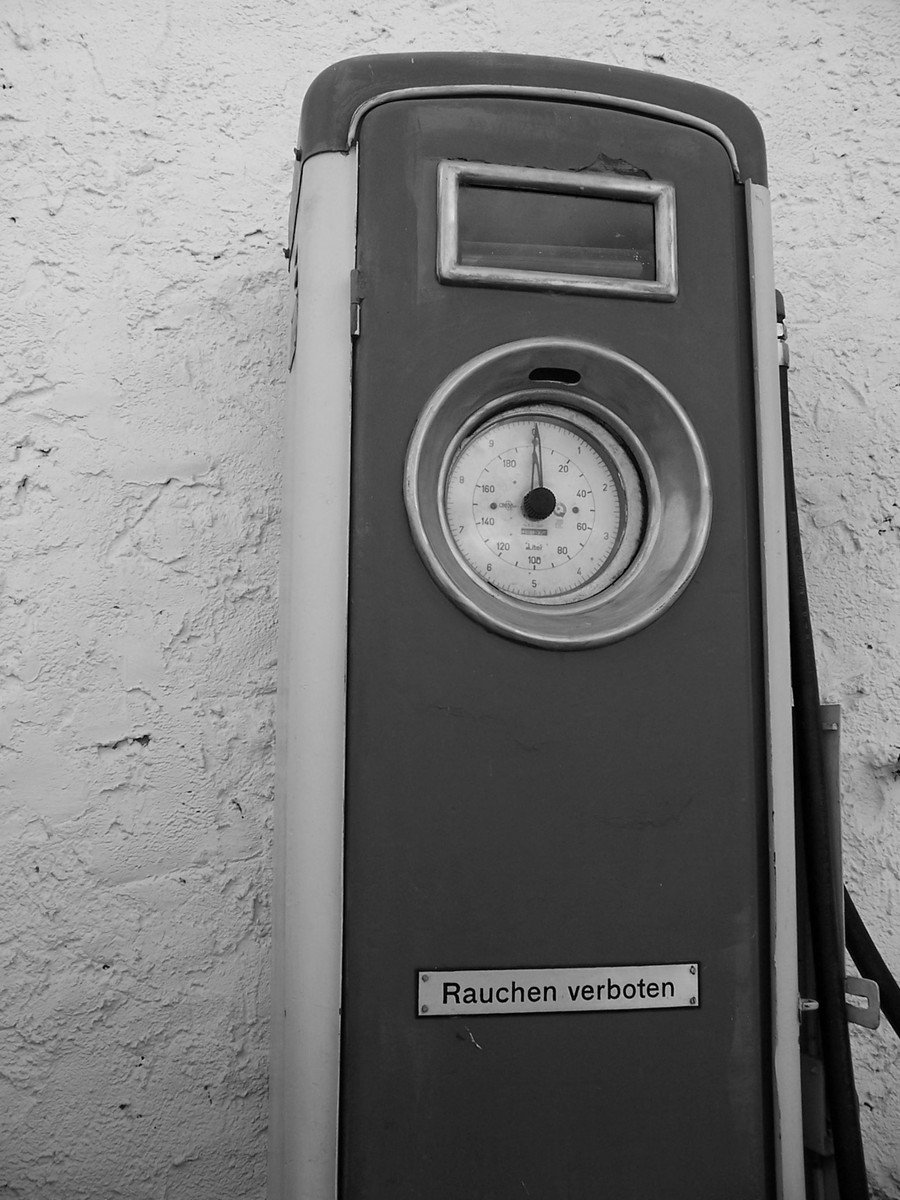 a meter sits against the wall of a building