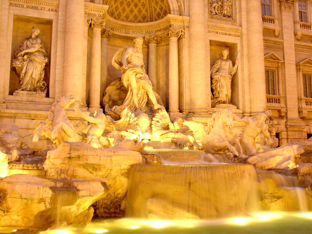 an image of the tredo fountain with lights on