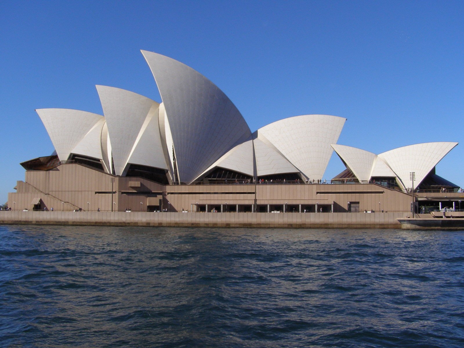 a very big pretty building that is by the water